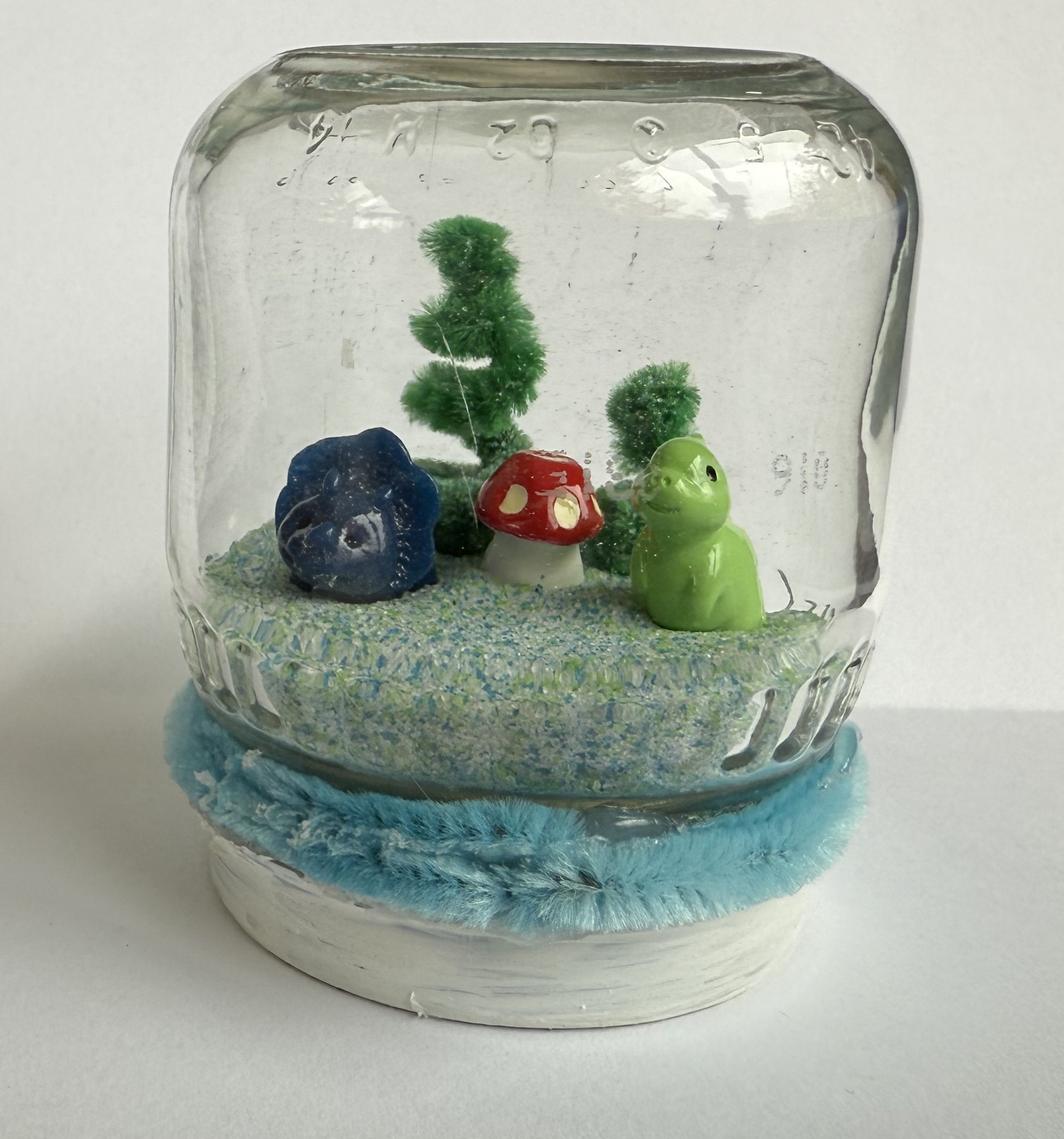 Picture of a mini-fairy garden in a jar