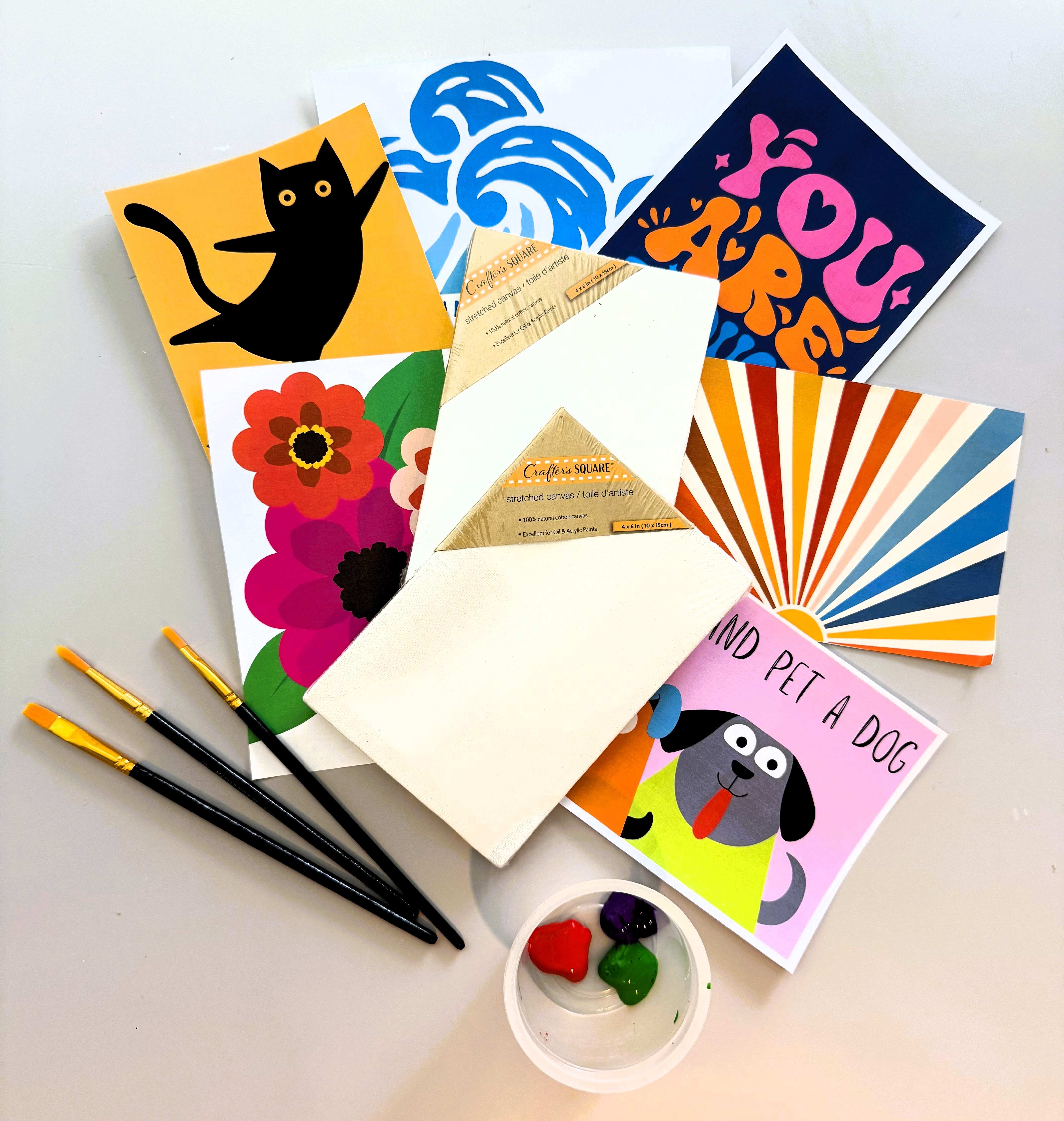 Picture of paper with various designs and brushes