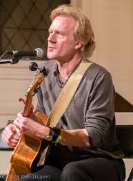 Picture of Rupert Wates Playing a Guitar