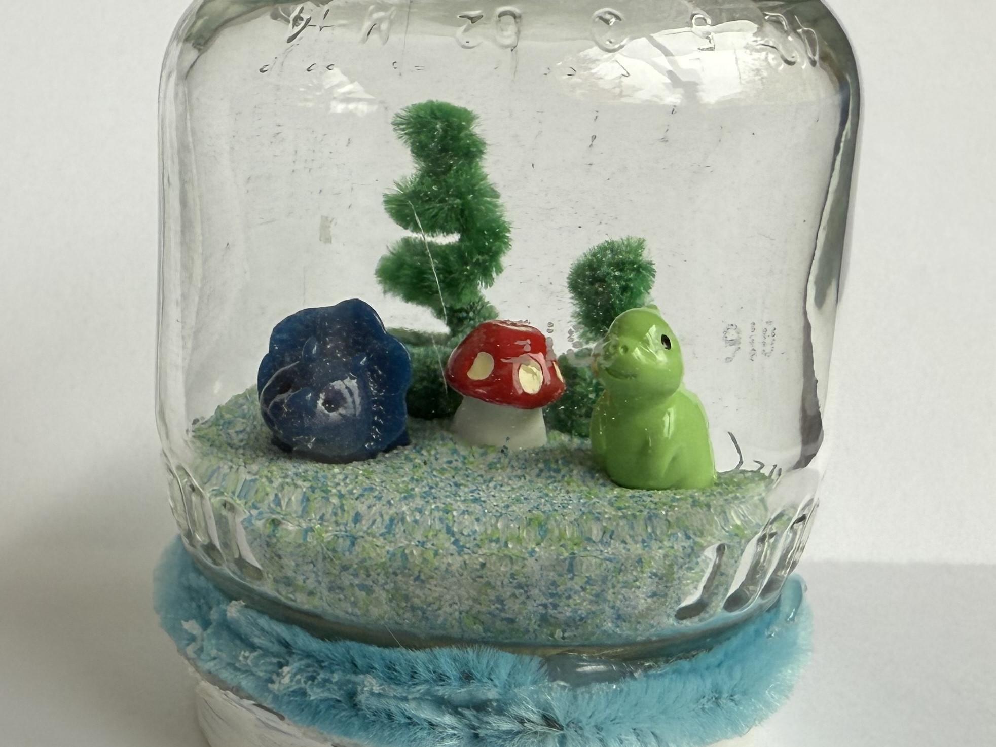 Picture of a mini-fairy garden in a jar