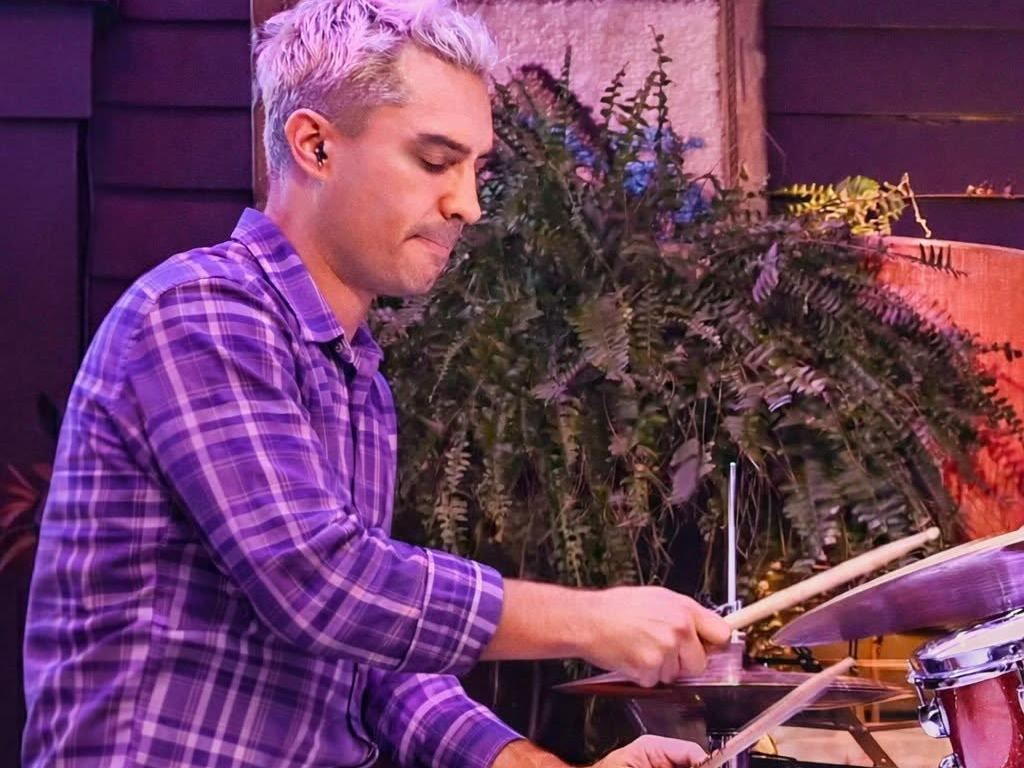 Picture of Kareem Sanjaghi playing the drums